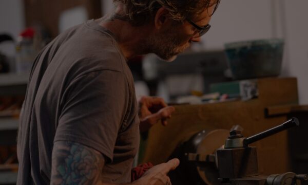 Man working at a lathe